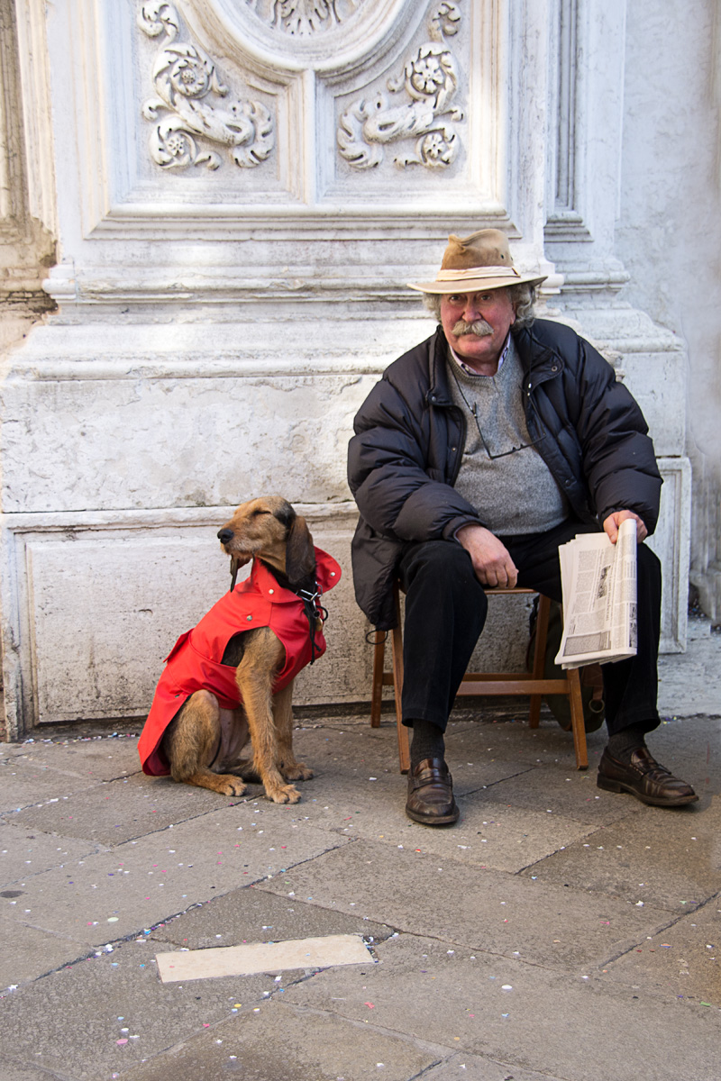 Man and a Dog with Red Jacket
