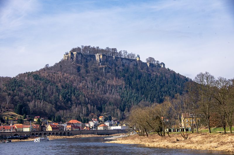 An ancient stone fortification guards the high ground