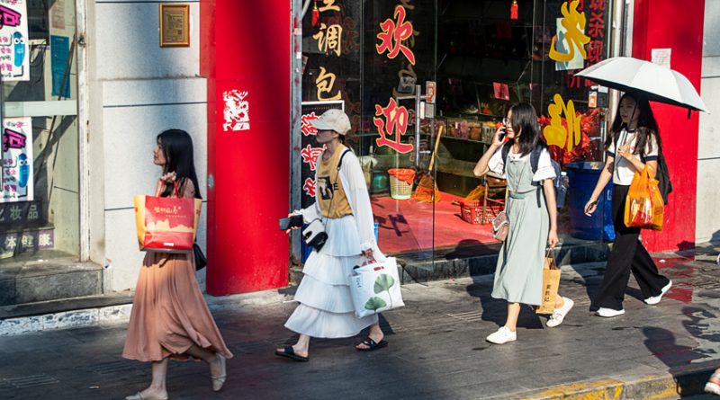 Not Abbey Road, or Bag Ladies with Phones, women on the street in Xiamen, China