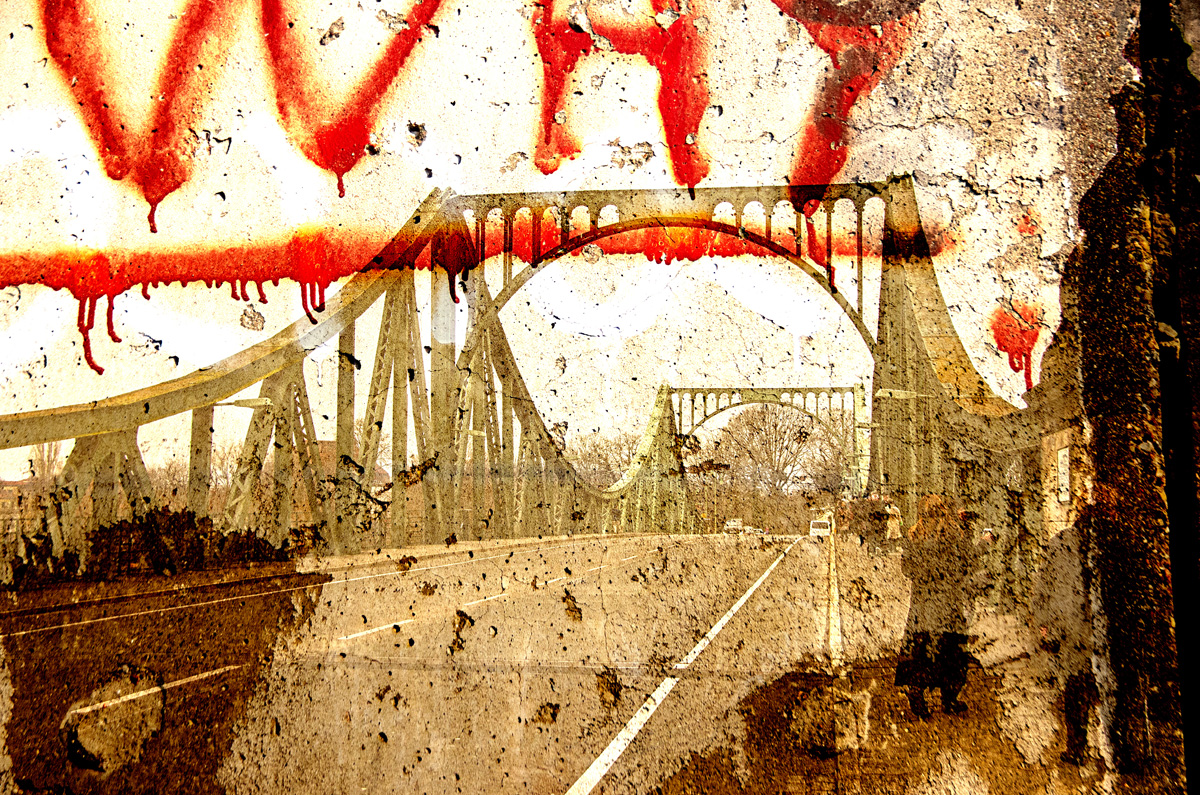 The Bridge of Spies in Pottsdam overlaid iwth a picture of a section of hte Berlin Wall on which someone painted "Why"