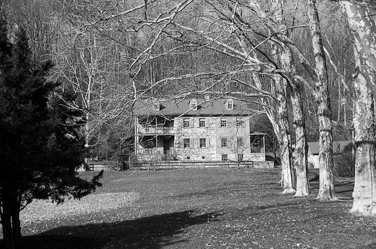 Stately old stone house near Kempton, PA, with a sycamore lined driveway