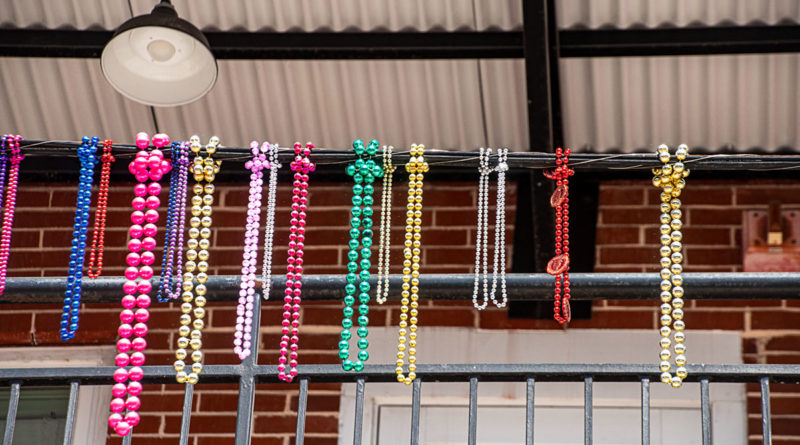 Beads on a Bannister in Ybor City (Tampa) where Cuban workers settled over a century ago making it a center for cigar production in the United States