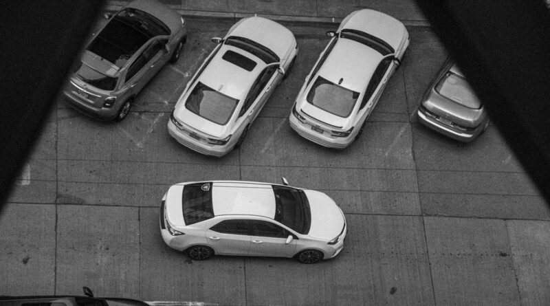 White Car Parking Symmetry