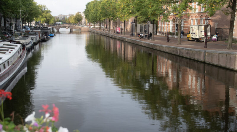 Amsterdam Canal with Flowers