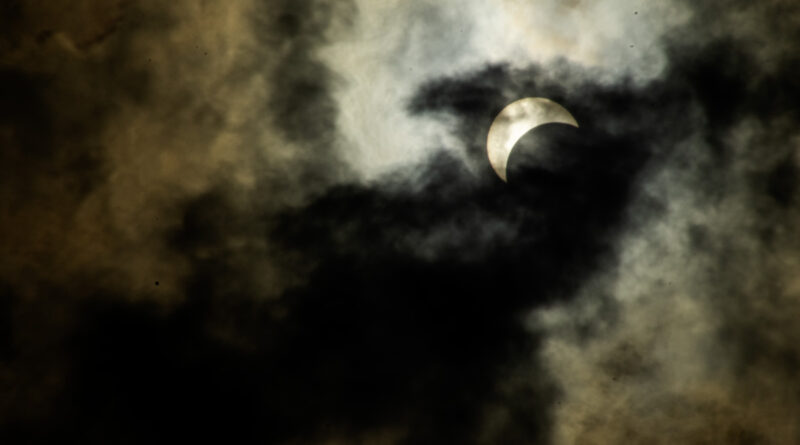 Partial Eclipse with Clouds